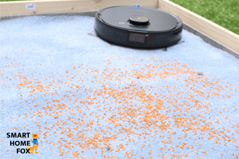 Deebot OZMO T8 AIVI during the lentil suction test on high-pile carpet